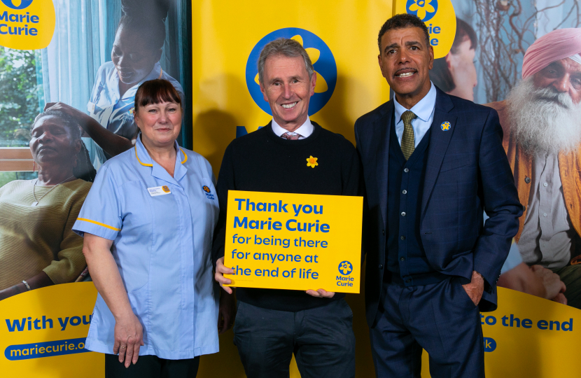 Nigel Evans pictured with Cherry Rowland and Chris Kamara at Marie Curie's Great Daffodil Appeal Event in Parliament