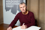 Nigel Evans MP pictured signing the Holocaust Memorial Day Book of Commitment